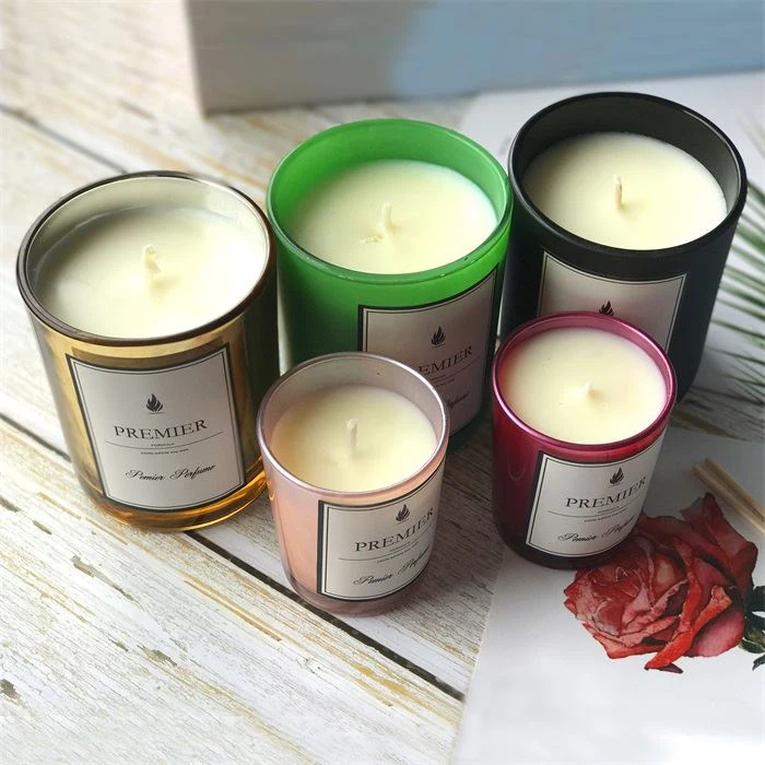 5. Natural soy wax candles with customized scents in glasses of different colors